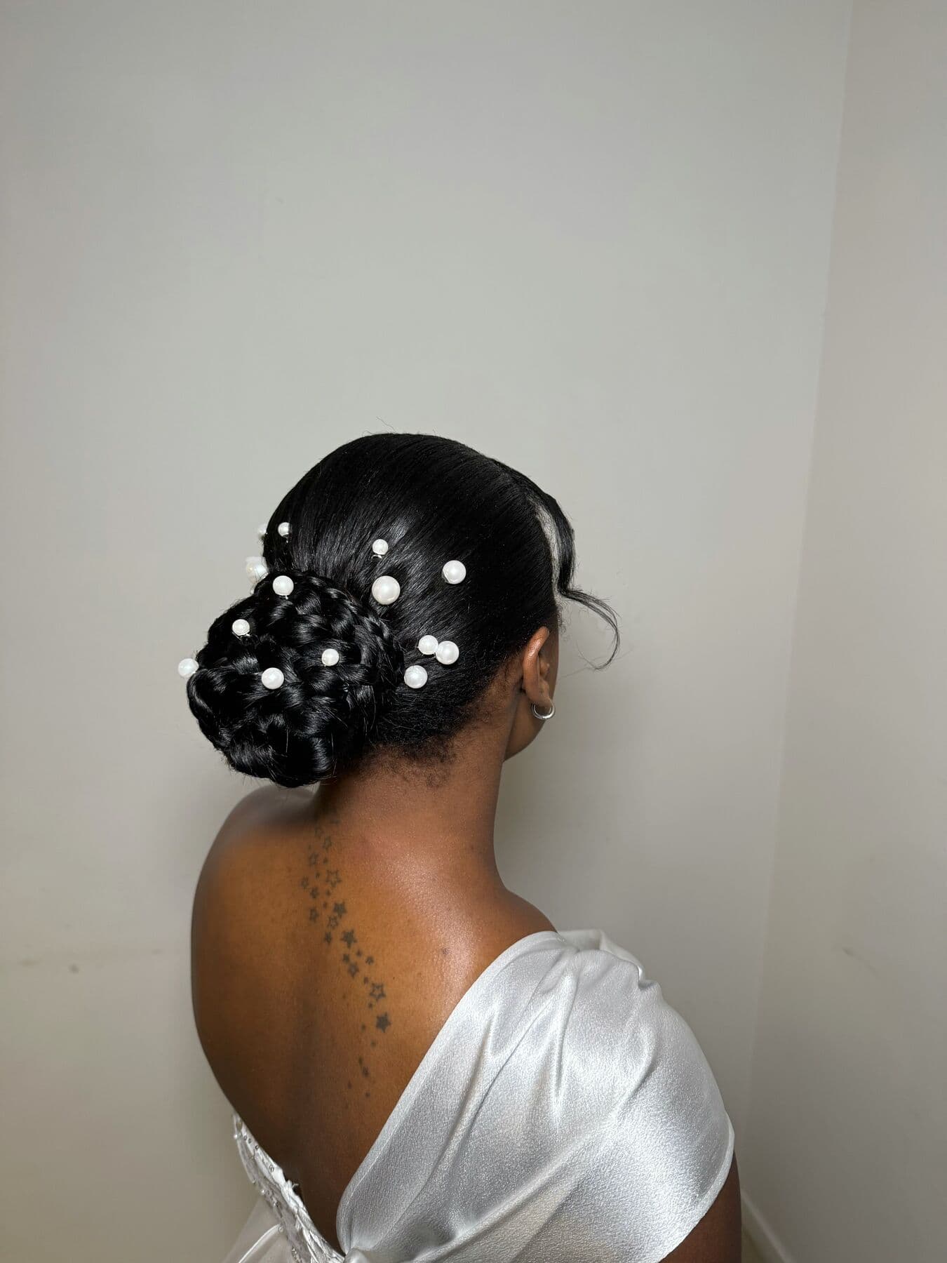 Recogido con perlas
